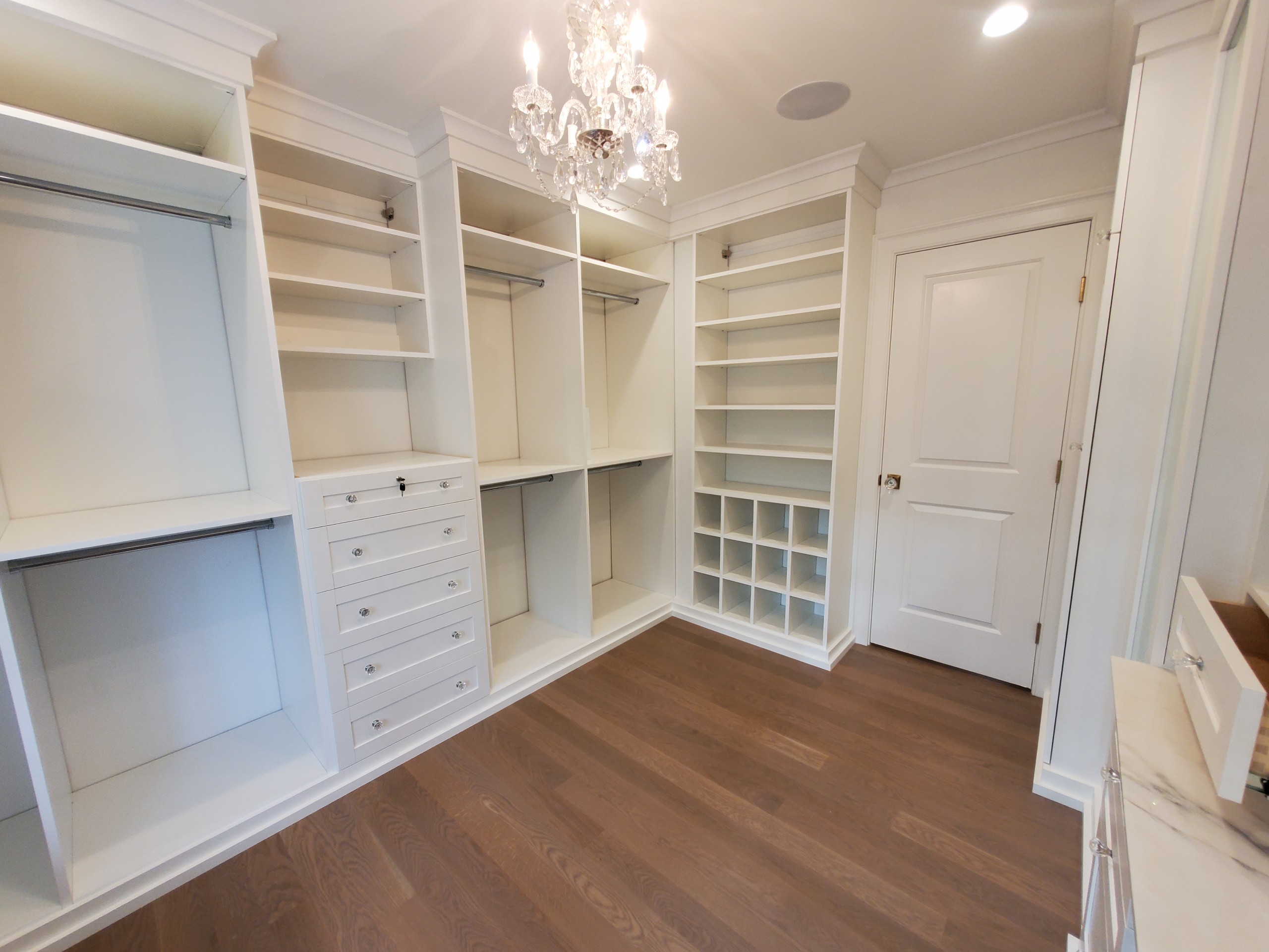 - View 3, Opens Model BoxWhite walk-in closet