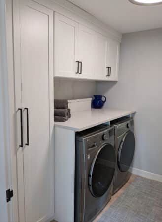 laundry room with Folding area and Storage Closets - View 38, Opens Model Box